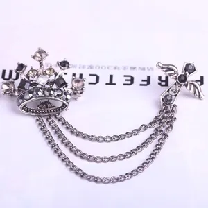 Vintage British style crown and cross brooch with triple chains and black rhinestones
