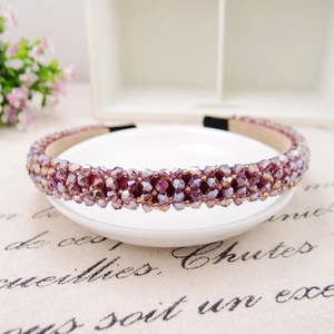 Macro shot of purple beaded headband showing detailed crystal craftsmanship and comfort tips