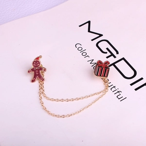 Détails de l'ensemble broche bonhomme en pain d'épices et boîte cadeau avec chaîne