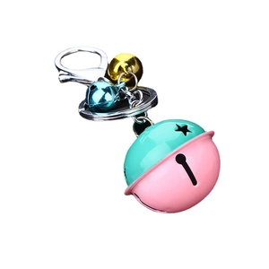 Minimalist bicolor metal bell keychain with green and pink star cutout finish and carabiner