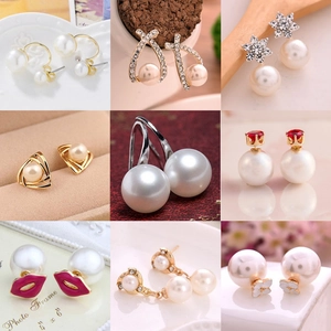Set of minimalist pearl earrings in diverse styles including stars, crowns and red lips