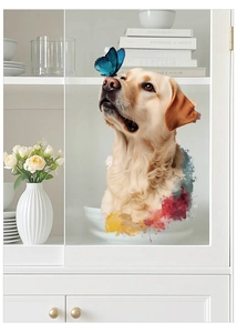 Detail of realistic golden retriever and blue butterfly sticker on cabinet glass