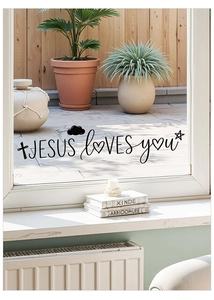 Dettaglio dell'adesivo murale in vinile Jesus Loves You applicato su una superficie vetrata