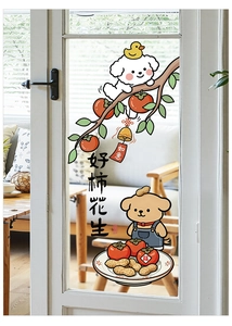 Detailed view of hand-drawn puppy and persimmon window stickers on a glass door
