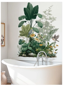 Detailed view of tropical palm leaf wall decals in a modern bathroom setting