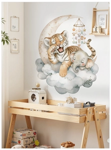 Nursery wall sticker with watercolor tiger and elephant decals on a decorated child room wall
