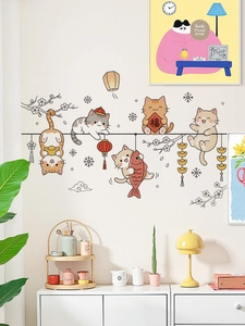 Détail de stickers muraux chat mignon avec éléments du Nouvel An chinois sur mur clair