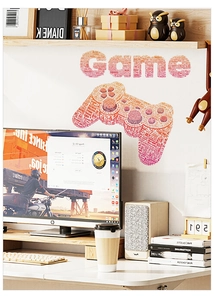 Detail of red gradient game controller wall sticker with word cloud pattern in game room