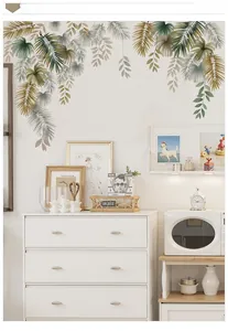 Detailed view of tropical palm leaves wall stickers in a minimalist Nordic home setting