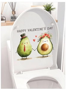Close-up of Valentine's Day toilet seat decal featuring cute avocado couple and greeting