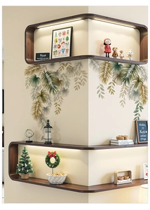 Detailed view of tropical palm leaf wall stickers in tiered green and brown natural hues
