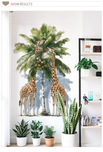 Realistic giraffe and palm tree wall sticker detail shown in a modern living room