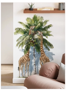 Detail showing giraffe and palm tree wall decal in a modern nursery room setting