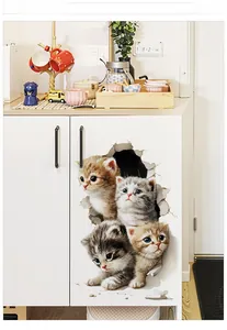 Detail of 3D cat wall decals featuring four cute kittens peeking through a broken wall hole