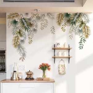 Tropical monstera leaf wall decal set in soft green tones for living room background