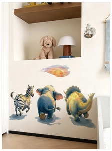 Detail of watercolor zebra and elephant wall decals applied on a nursery room wall