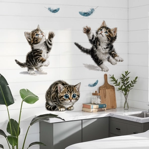Removable cartoon cat wall stickers with playful kittens and blue feathers for nursery