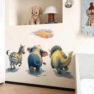 Watercolor zebra and elephant wall stickers for nursery decor in a cozy kids room