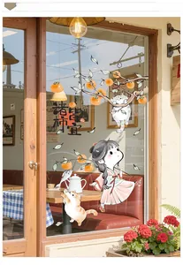 Détail d'autocollant mural de Nouvel An avec illustration de fille, chat et kakis