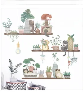 Detailed view of removable cartoon cat and potted plant wall stickers on shelves