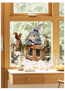 Detailed view of cute rabbit and farm animals window sticker on a wooden frame