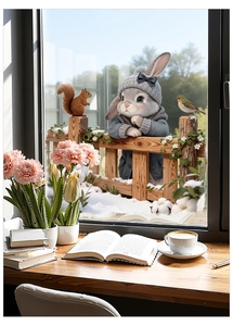 Cozy winter window decal featuring cartoon rabbit and squirrel in a warm home office setting