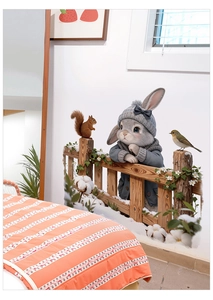 Close-up of rabbit in blue coat and hat on a wooden fence decorative wall sticker