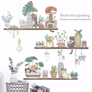 Watercolor cat and potted plant wall stickers in a cozy minimalist interior setting