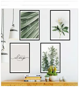 Set of four Nordic wall art prints featuring green botanical leaves and minimalist quotes