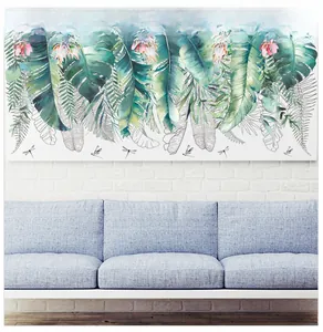 Detail of tropical plant wall decal featuring green leaves and red flowers on a brick wall