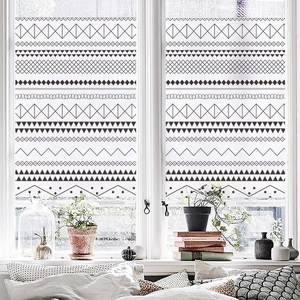 Moroccan style frosted privacy glass film with black geometric patterns for home windows