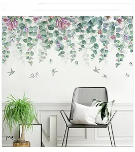 Detailed view of eucalyptus wall stickers with birds and nature quote in a modern room