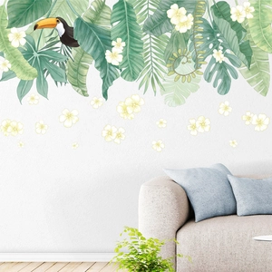 Tropical green leaves and toucan wall stickers for a minimalist Nordic living room decor