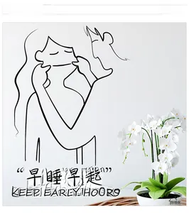 Detail of minimalist wall decal featuring black illustration and Keep Early Hours text