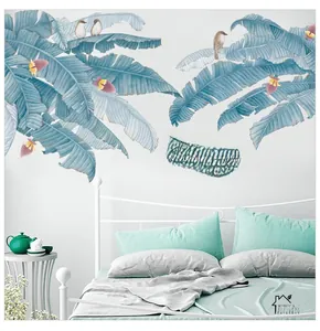 Detail of Nordic plantain leaf wall decals with watercolor birds above a bed