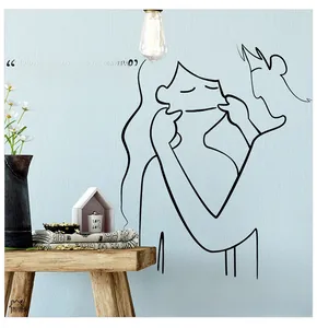 Detail of minimalist couple line art wall decal with Keep Early Hours English lettering
