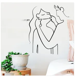 Detail of minimalist couple line art wall decal with Keep Early Hours English text
