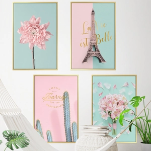 Modern Nordic 4-piece wall art set with pink floral and Eiffel Tower prints in gold frames
