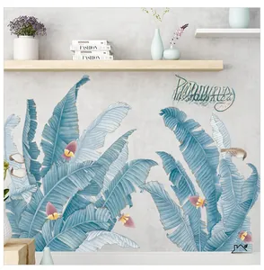 Detail of Nordic plantain leaf wall stickers with blue leaves and birds on gray wall