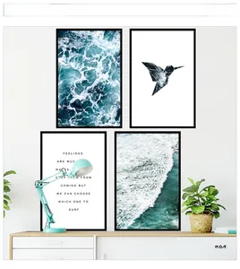 Close-up of minimalist four-piece wall art set featuring seascapes and hummingbird prints
