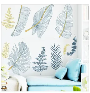 Detail view of botanical wall stickers with Morandi blue and gold leaf patterns