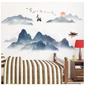 Detailed Chinese ink landscape wallpaper with mountain peaks and calligraphy text in a bedroom