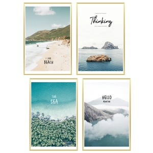 Set of four modern landscape wall art prints with minimalist gold frames for home decor