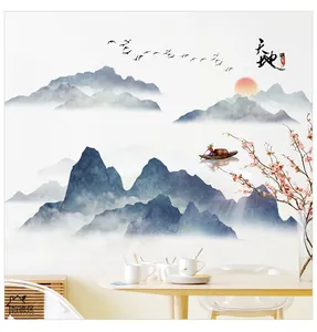 Detail of Chinese ink wash wallpaper with mountains, red sun, birds and peach blossoms