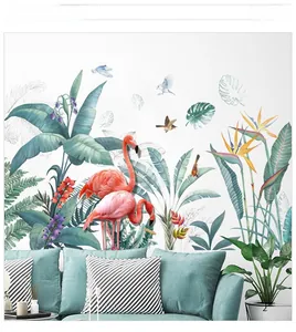 Detailansicht der Wandtattoo mit rosa Flamingos und tropischen Monstera Blättern im Wohnzimmer