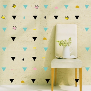 Nordic minimalist geometric triangle and crown wall decals on a textured living room wall