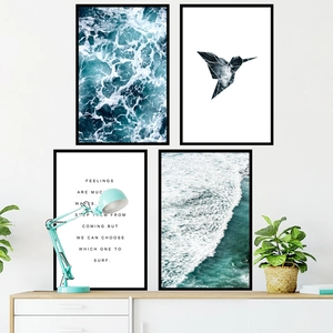 Modern Nordic four-piece wall art set with ocean waves and hummingbird in black frames
