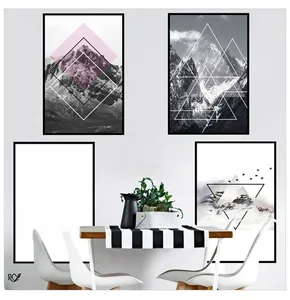 Detailed close-up of modern geometric mountain wall art set in a stylish dining room