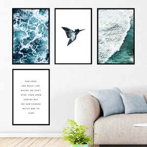 Modern Nordic 4-piece framed wall art set featuring blue ocean waves and geometric hummingbird