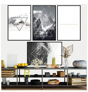 Detail of four-piece modern wall art set with mountain photography and geometric prints